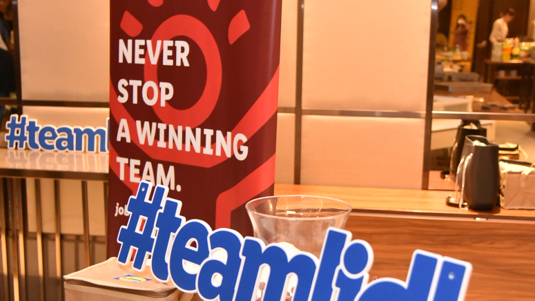 lidl employees with lidl-cake